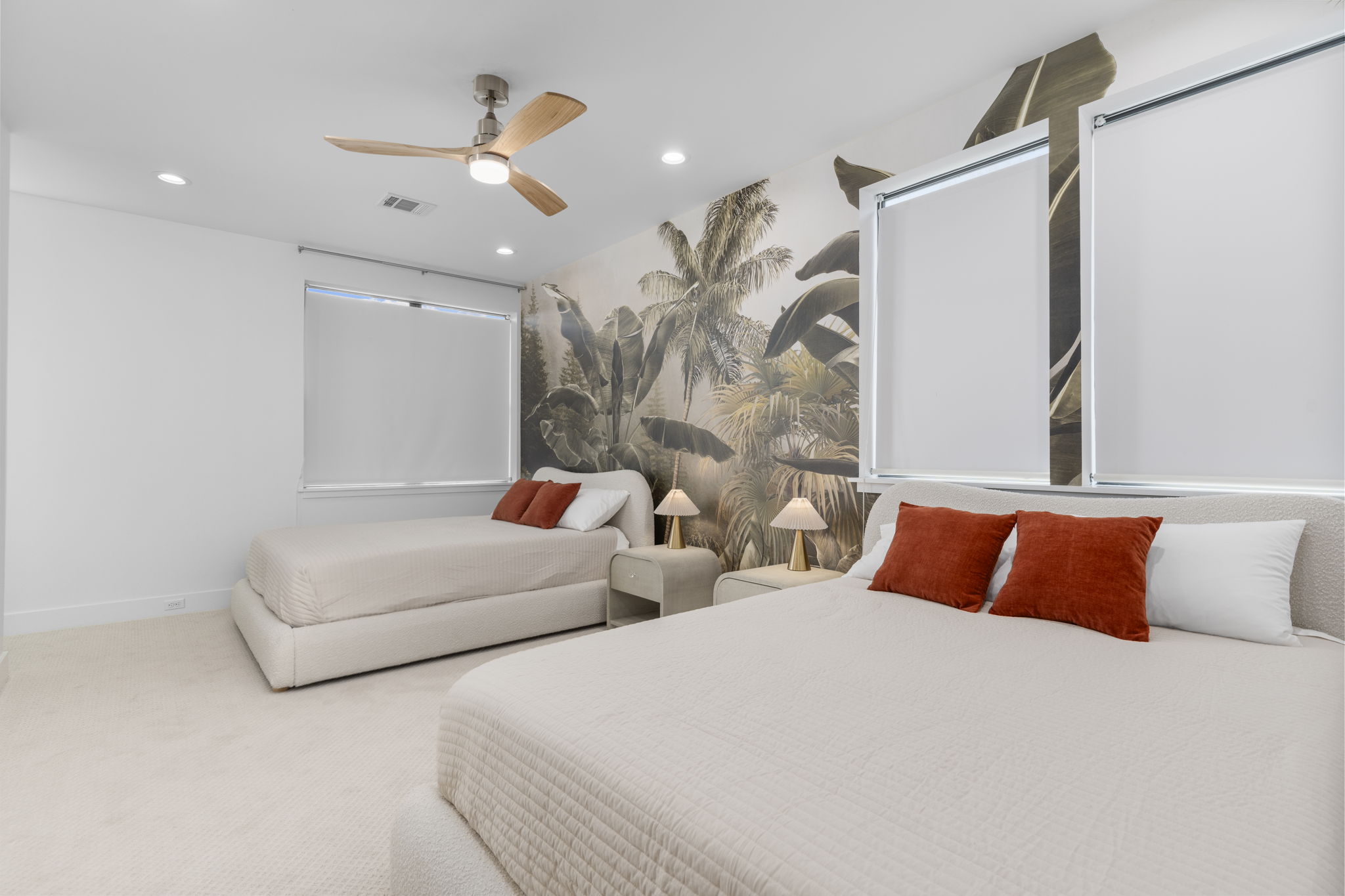 Bedroom with tropical wallpaper