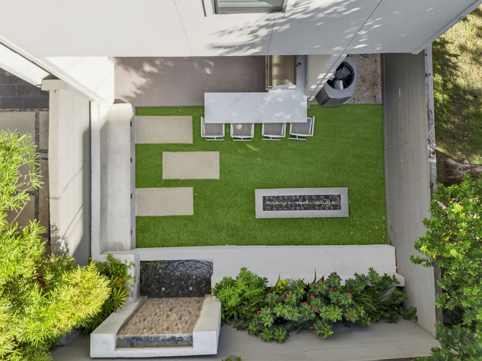 Wide aerial shot of the property and surroundings